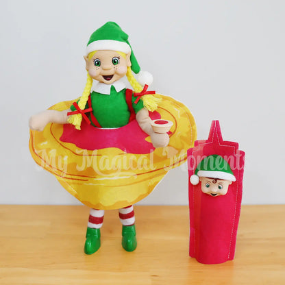 elf wearing a meat pie costume with elf toddler in a ketchup costume