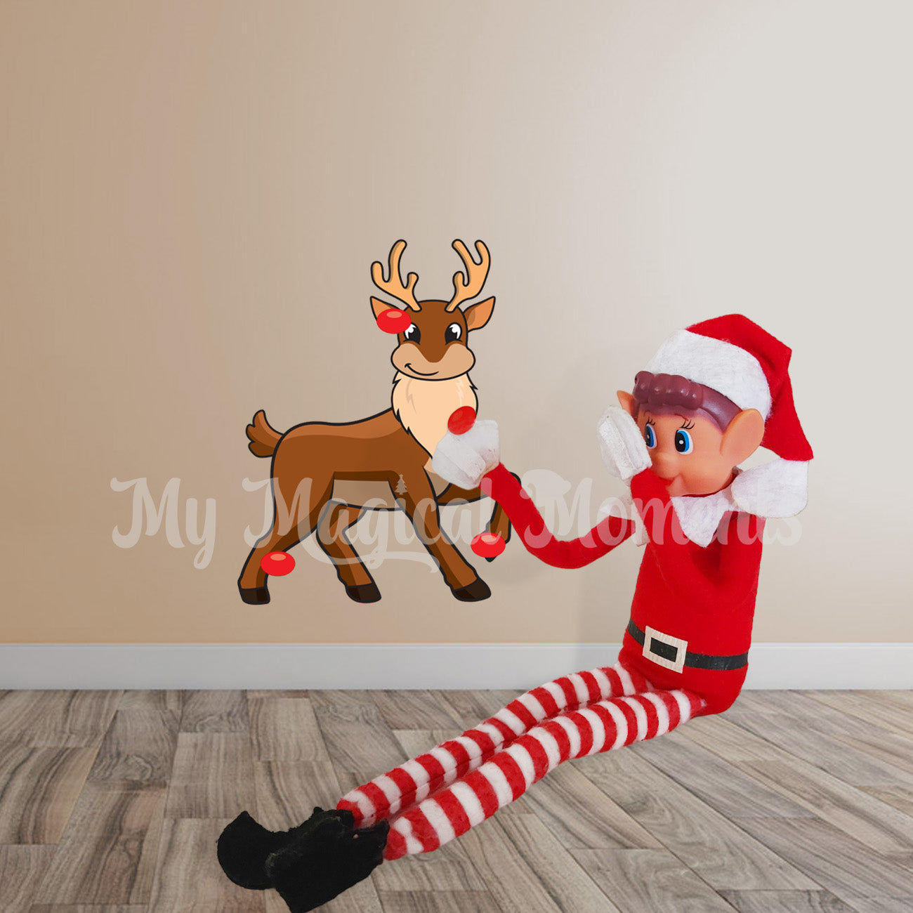 Elves behavin badly playing pin the nose on the reindeer with sticker