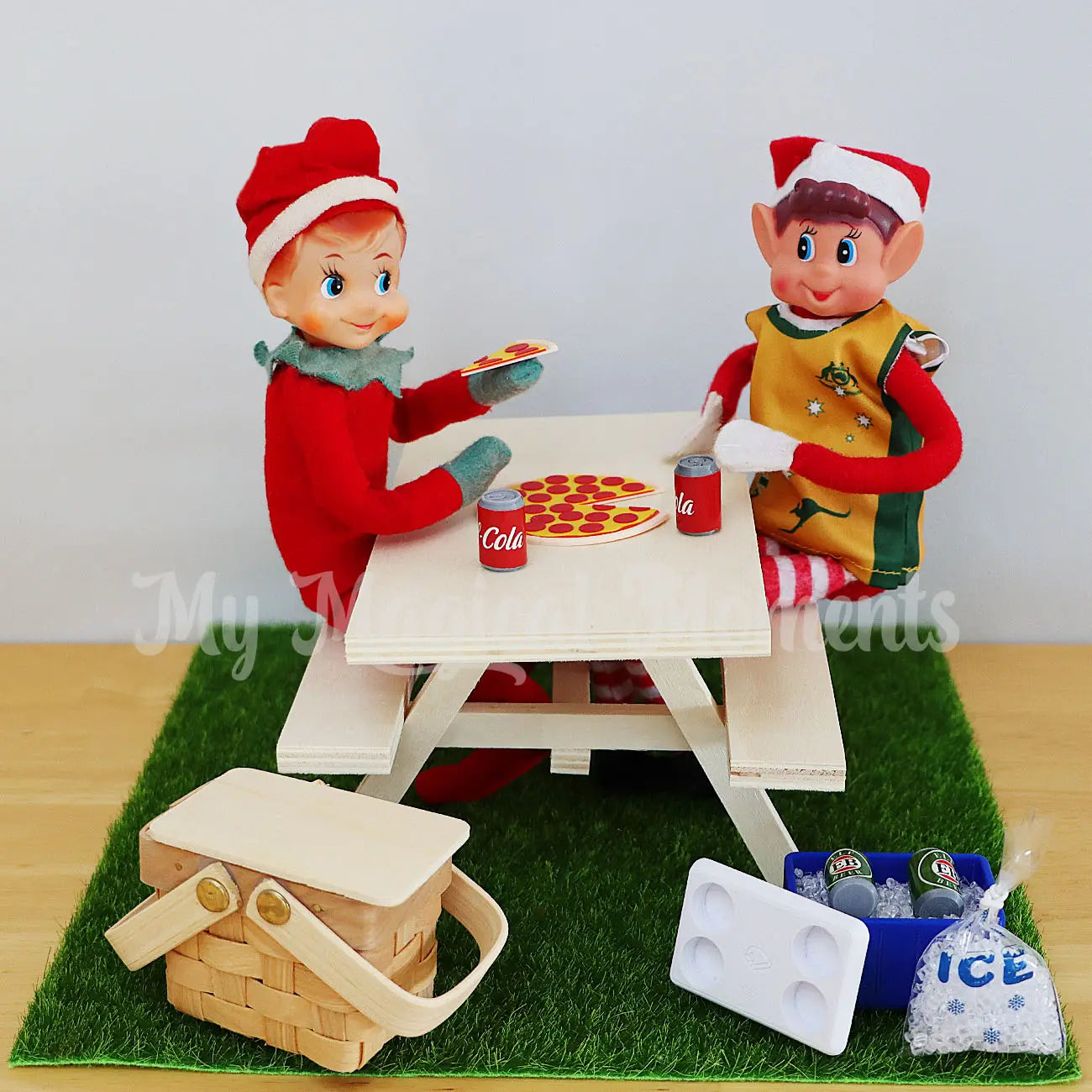 elves having a picnic with pizza, esky and beer