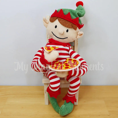 Elf eating pizza on a chair