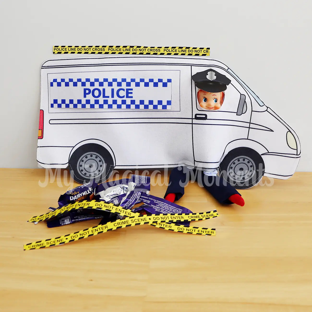 Police Van worn by an elf at a chocolate crime scene