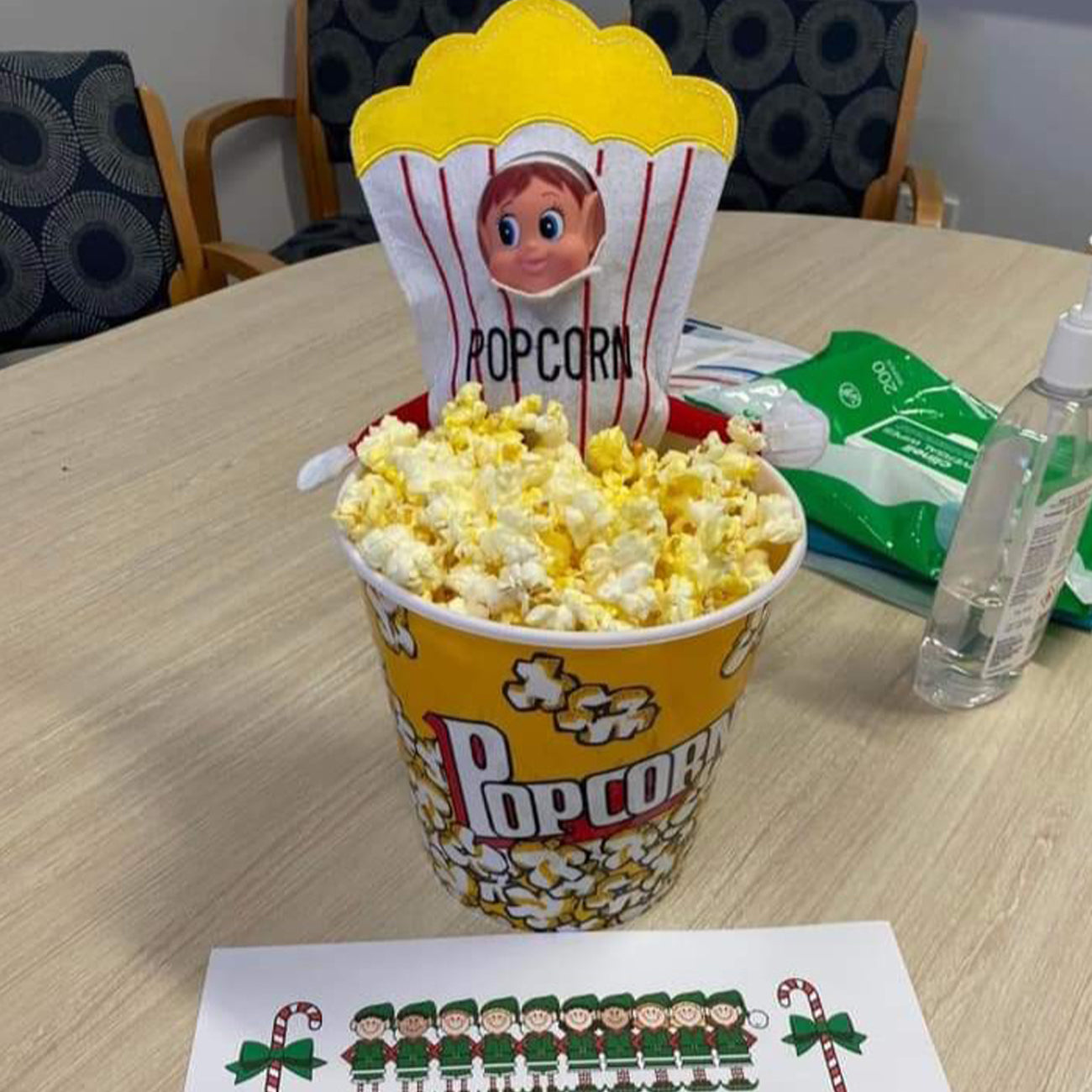 Elf customer popcorn scene