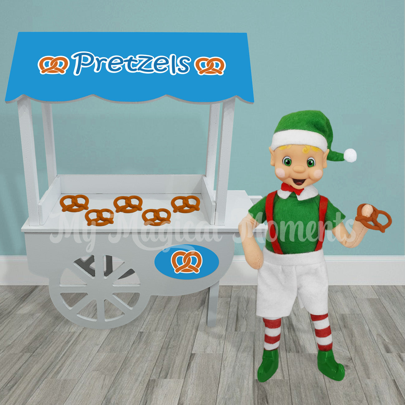 Elf set up with a pretzel stand and an elf holding a miniature pretzel prop