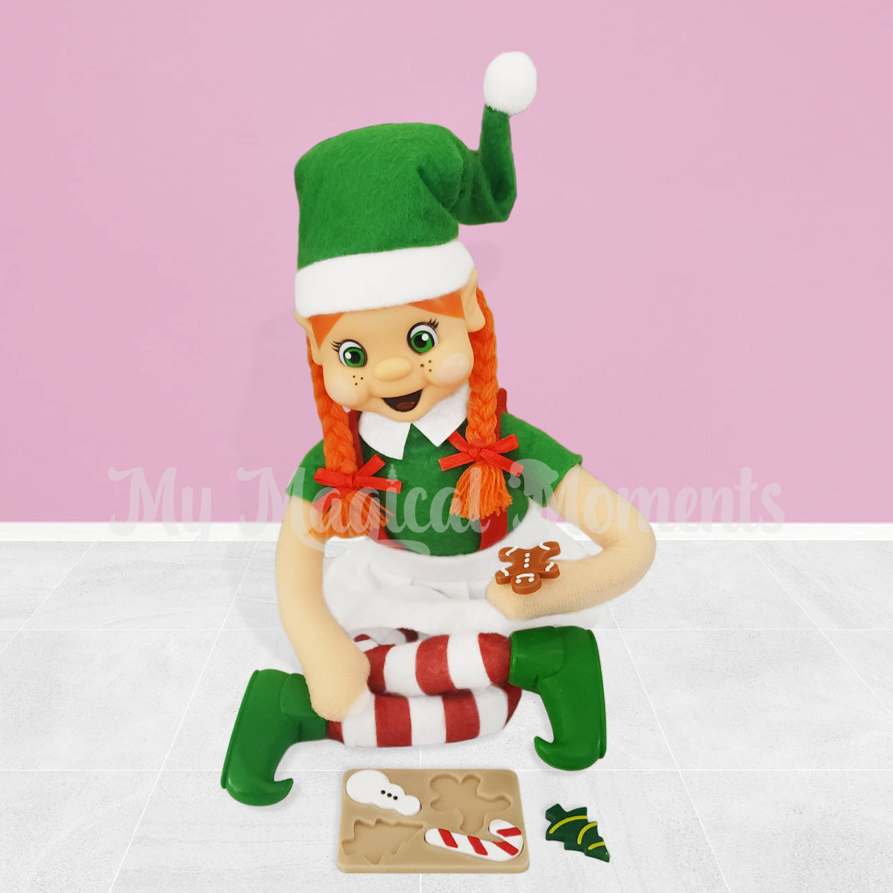 Orange hair girl elf doing a puzzle prop on the floor