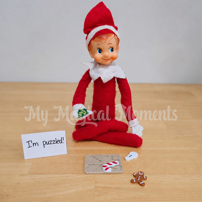 Vintage elf playing with a mini puzzle prop, with a sign saying i'm puzzled