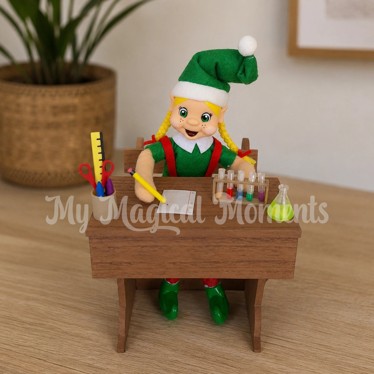 Girl blonde hair elf sitting at a mini school desk with mini chemistry props and stationery set. 