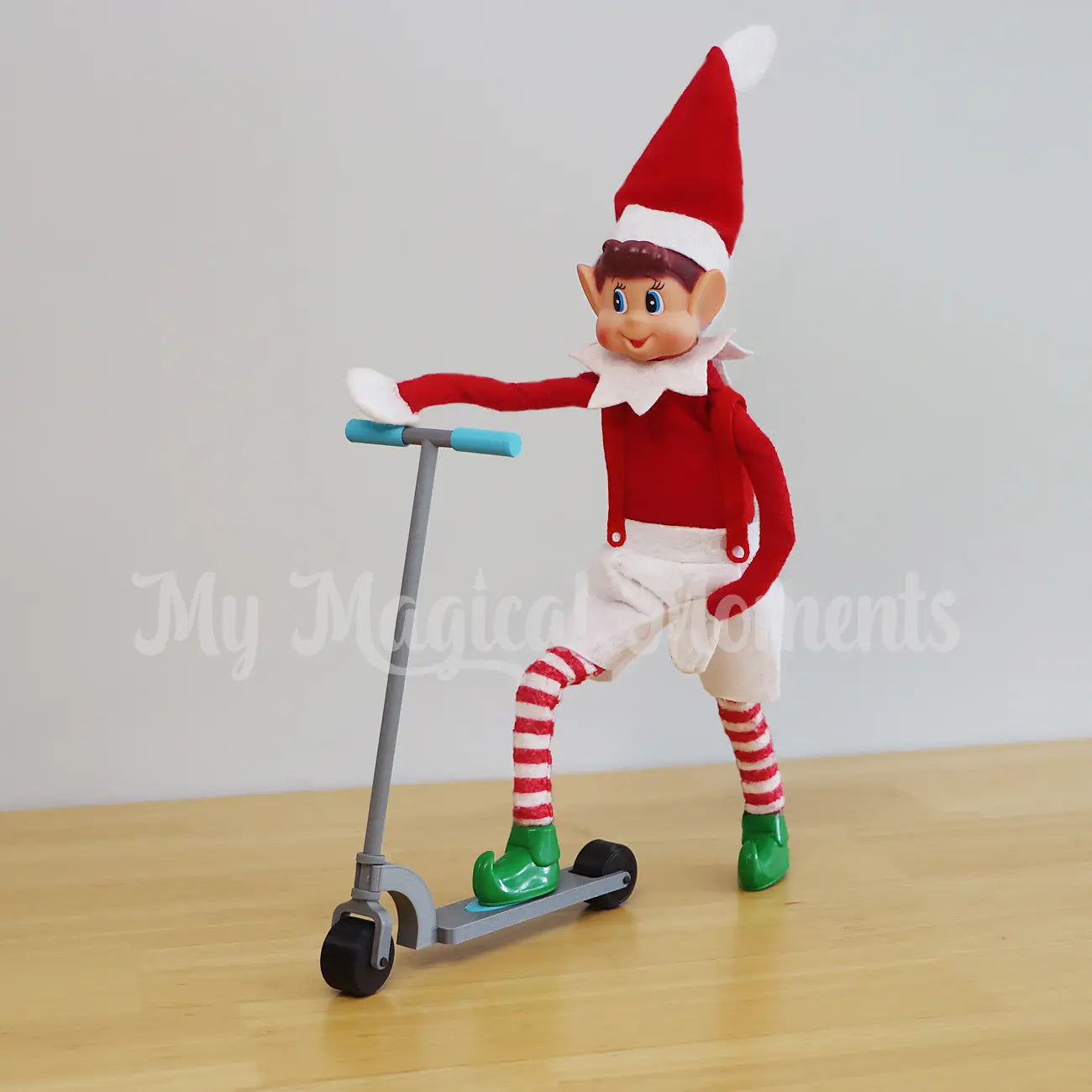 Elves behavin badly wearing elf shoes on a scooter