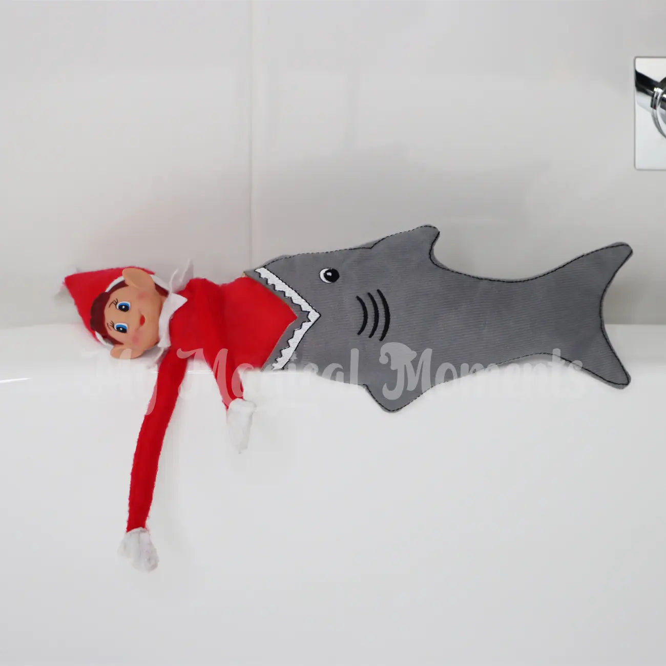 Elves behavin badly dressed in a shark costume