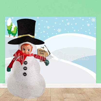 Elf wearing a snowman costume