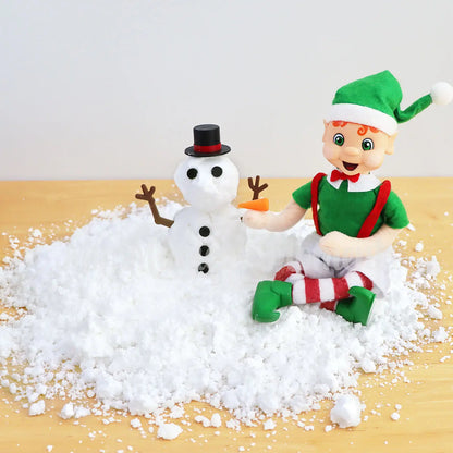 Orange hair My Elf Friends building a snowman with  a melting snowman prop with fake snow