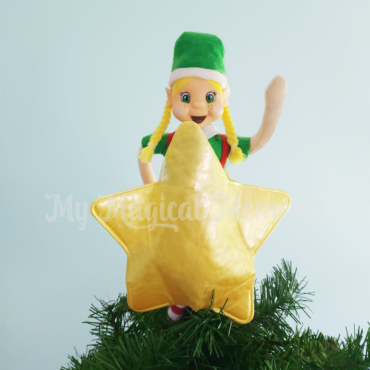 Star Elf Costume on top of the tree