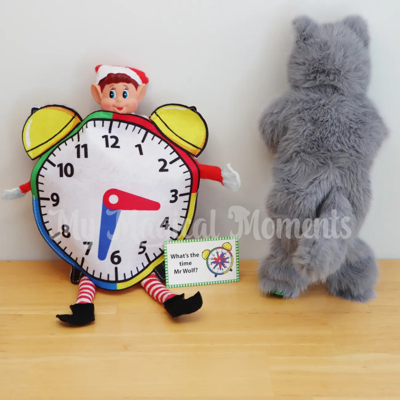 Elf wearing a clock costume playing what's the time Mr Wolf