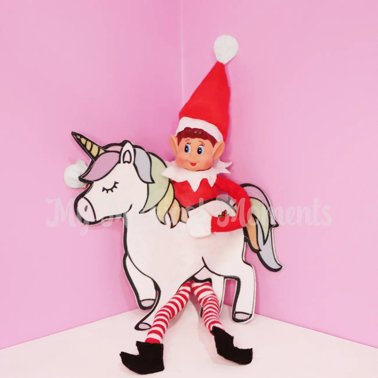 Elf wearing a unicorn costume on a shelf