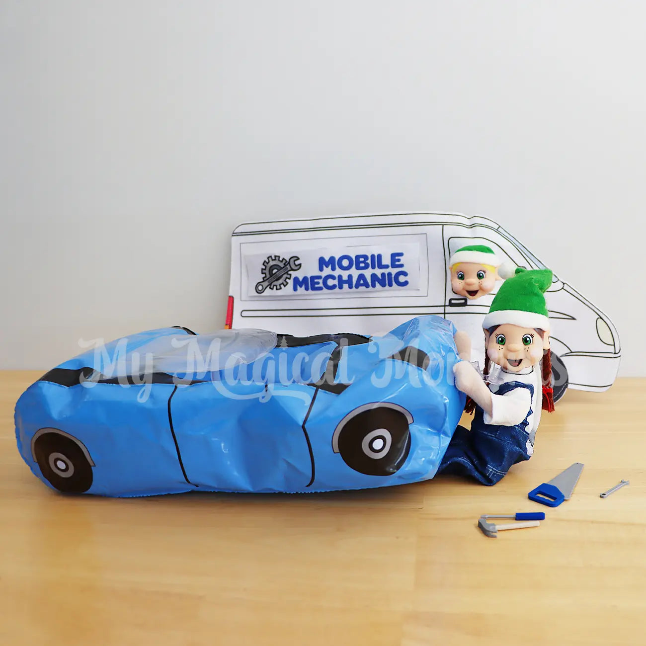 Elves in a mobile mechanic fixing a car