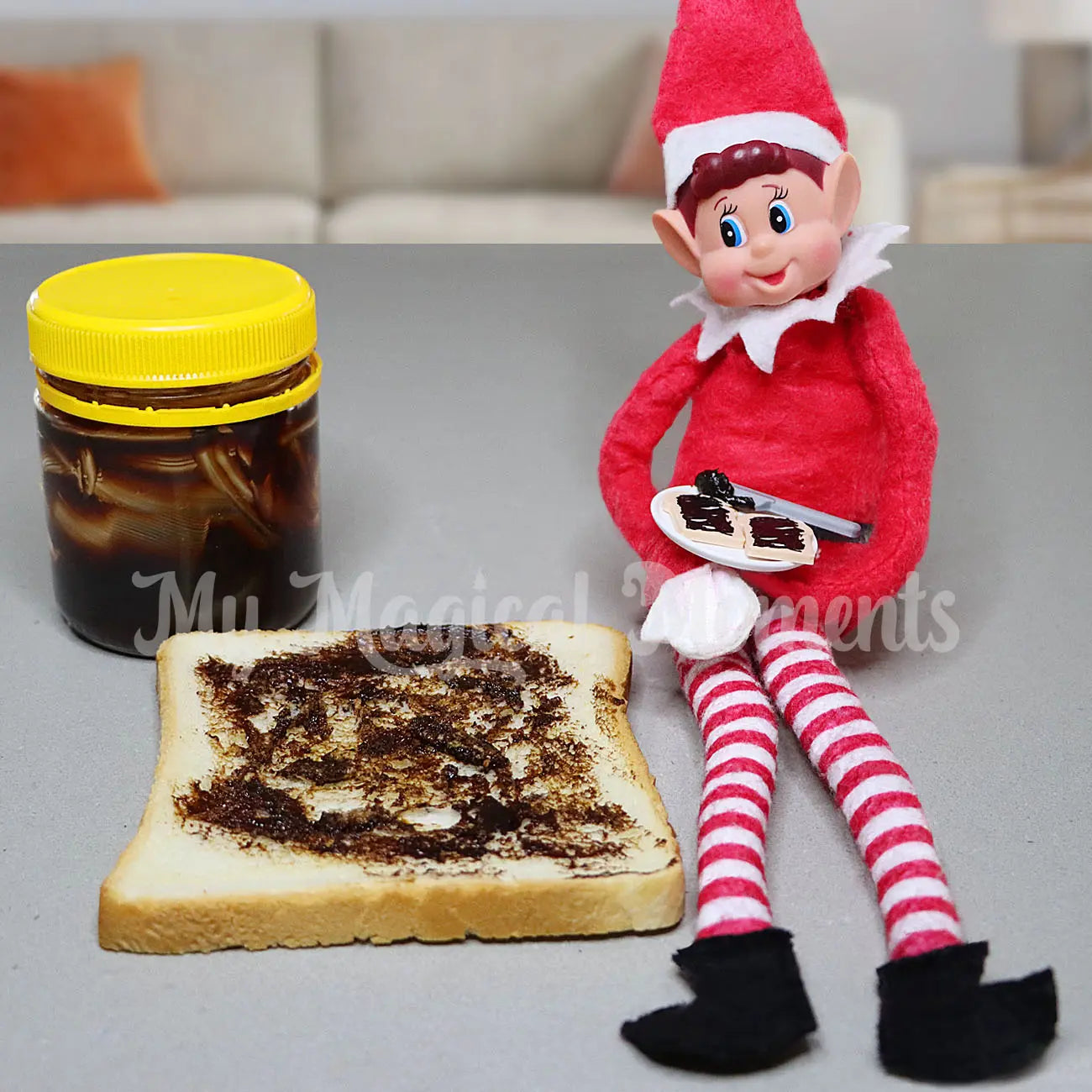 Elf making mini vegemite spread on toast