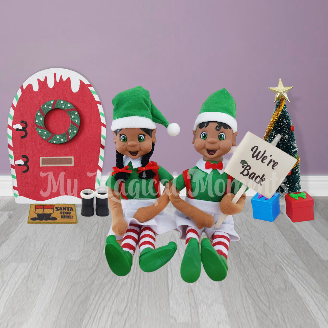 Black hair elves sitting with their elf door and holding were back sign