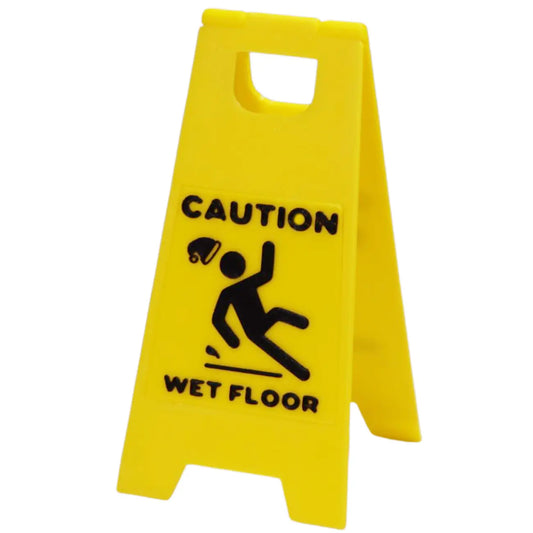 Elf Prop Wet Floor Sign With an Elf slipping