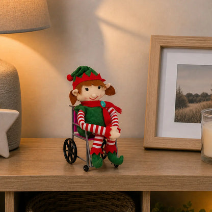elf for christmas in  a pink wheelchair in the home