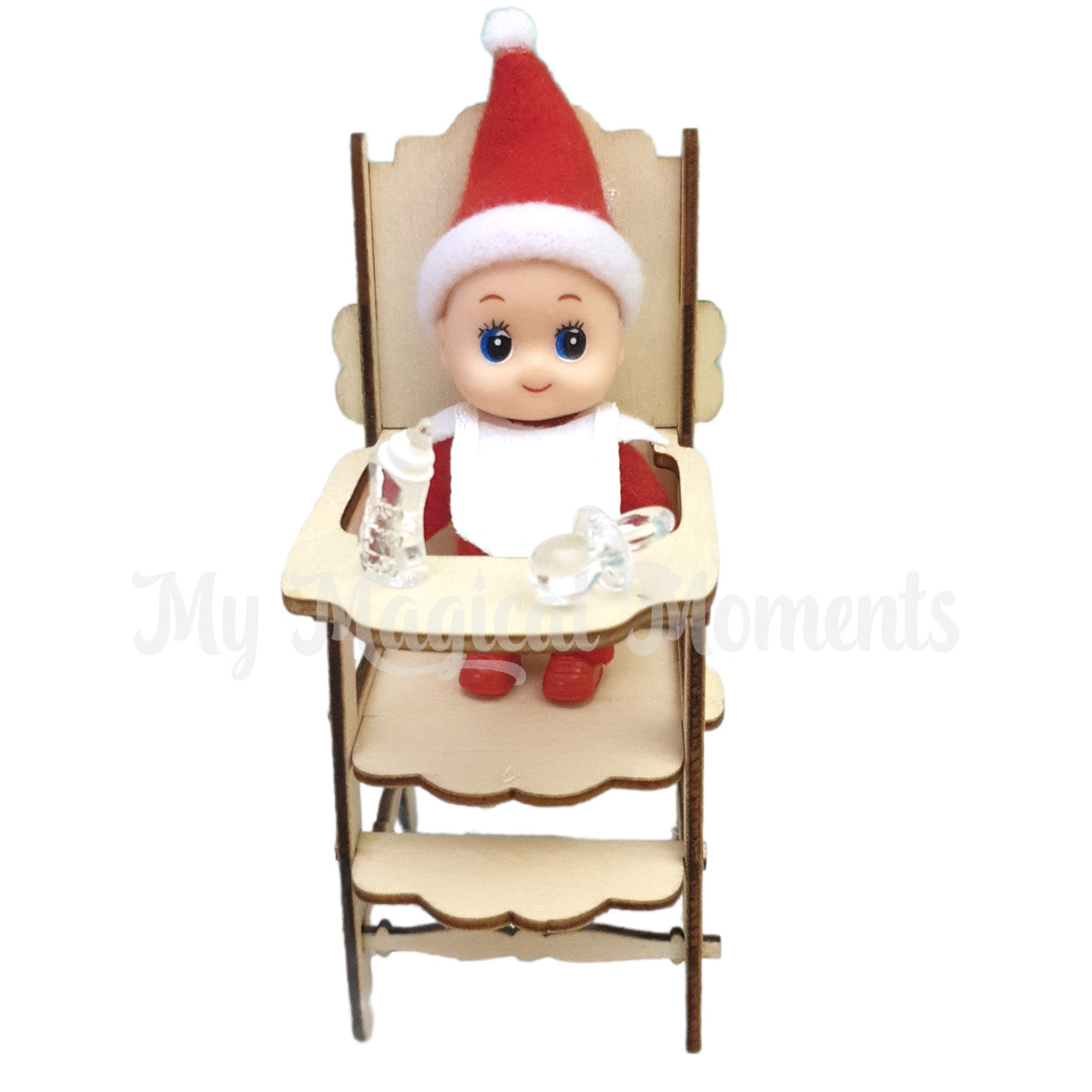 Elf baby sitting in miniature high chair prop