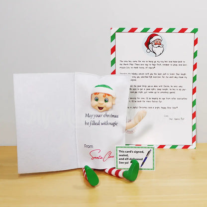 Elf wearing a Christmas Card Costume and a Free Elf Goodbye Letter