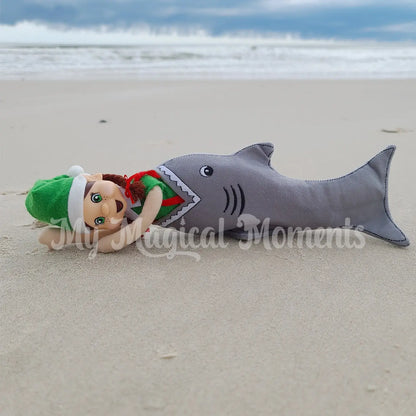 elf shark costume on a beach