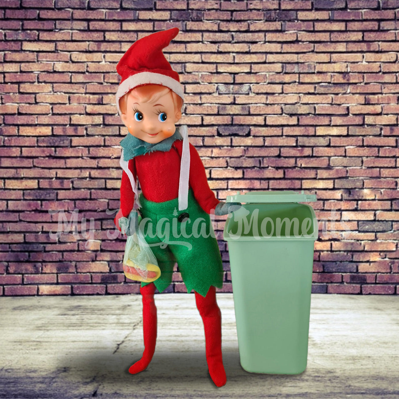Elf using a bin prop to take our miniature trash