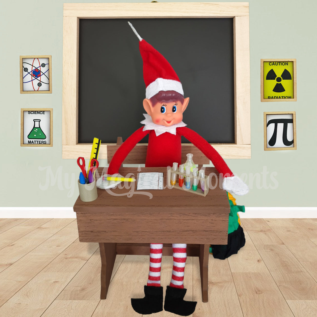 Elves behavin badly sitting at a miniature school desk learning chemistry. They have a backpack and chalkboard in the scene