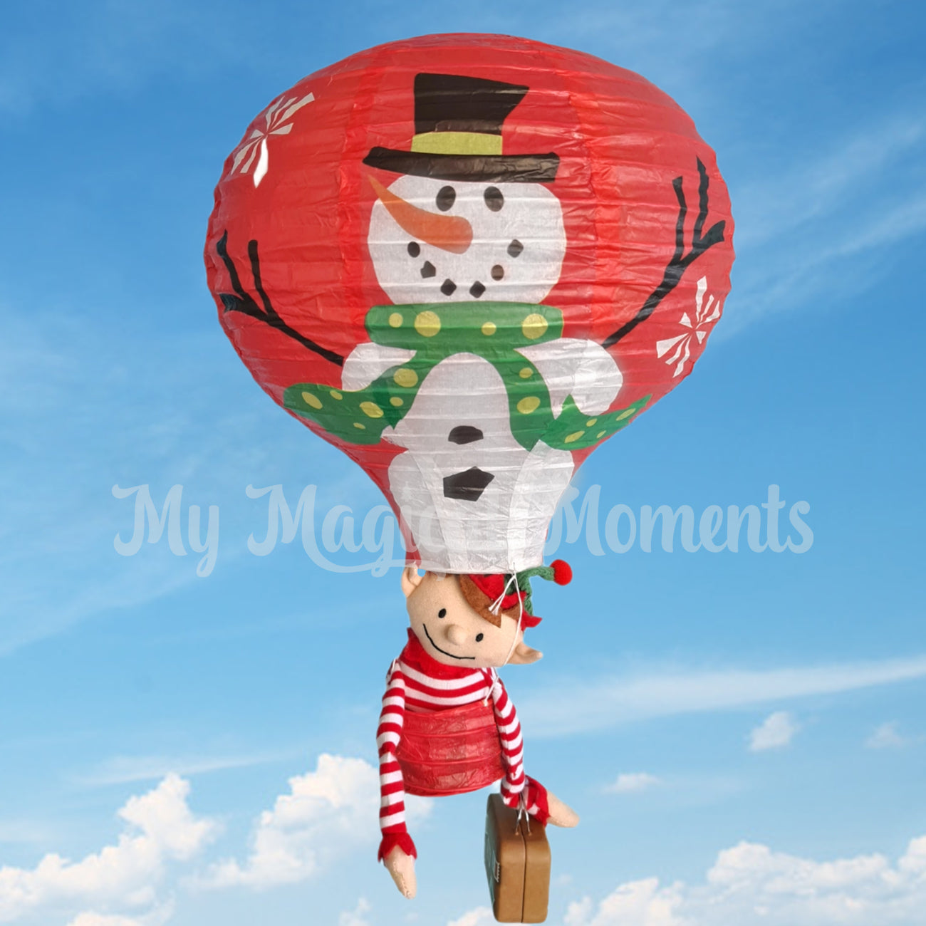 elf with a suitcase in a hot air balloon