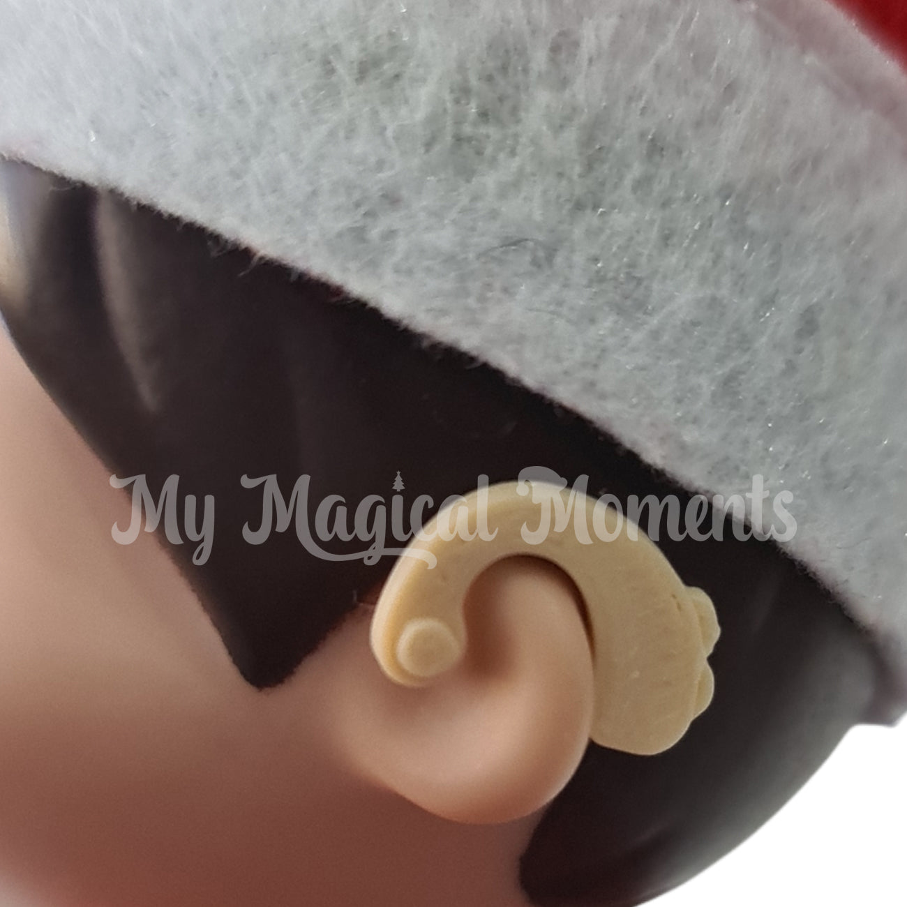 Elf on the shelf wearing a hearing aid