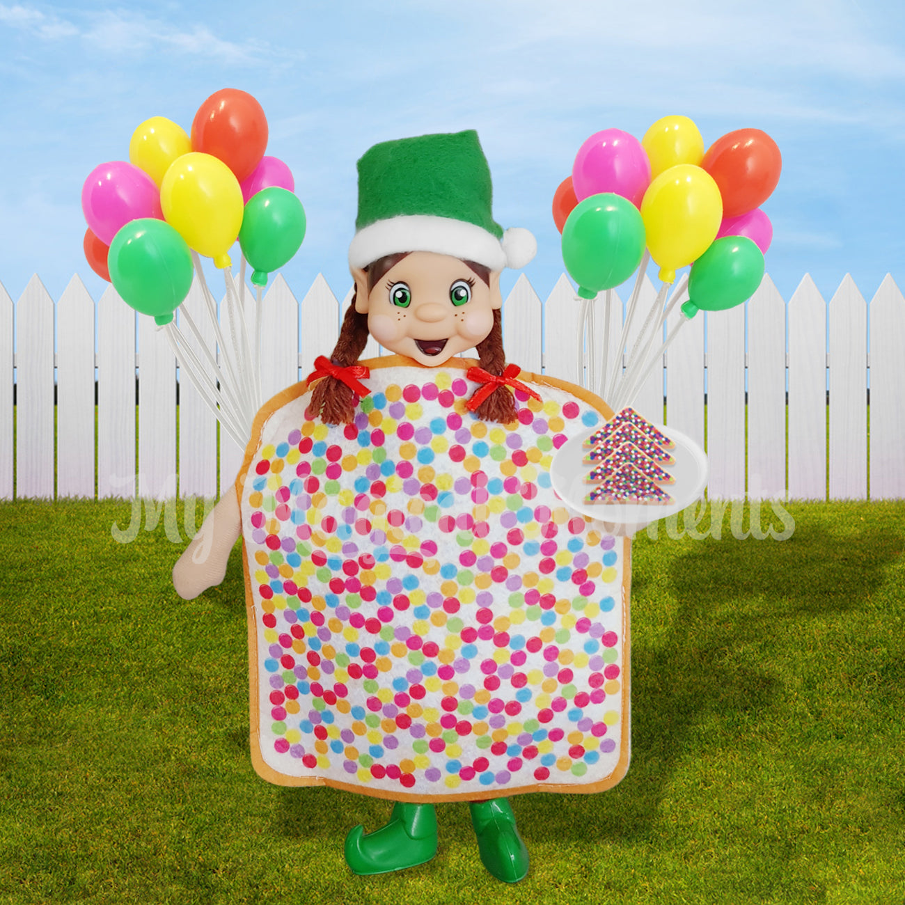 Elf wearing a fairy bread dress up at a party holding miniature fairy bread