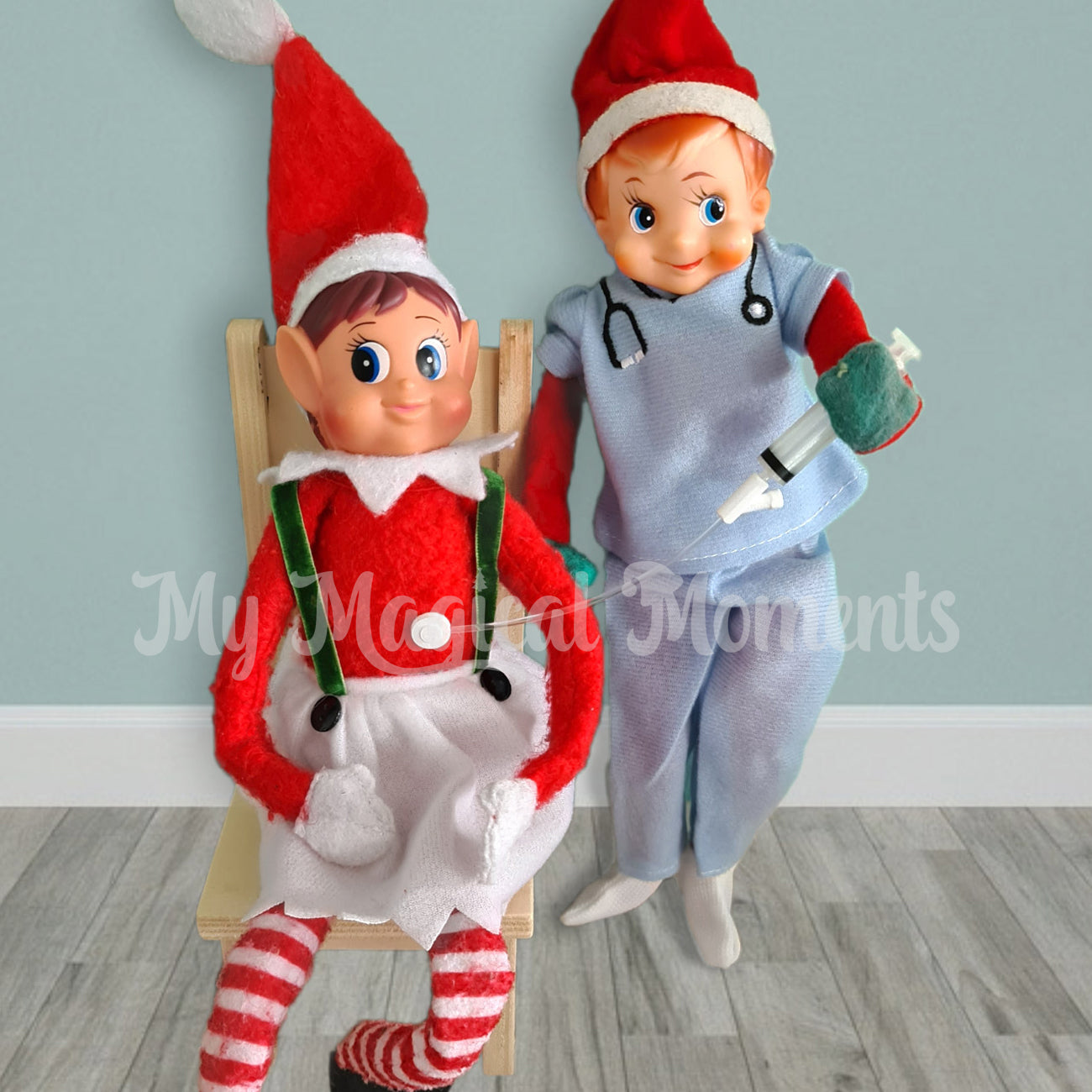 Elf dressed as a nurse using a miniature feeding apparatus on an elves behavin badly girl elf