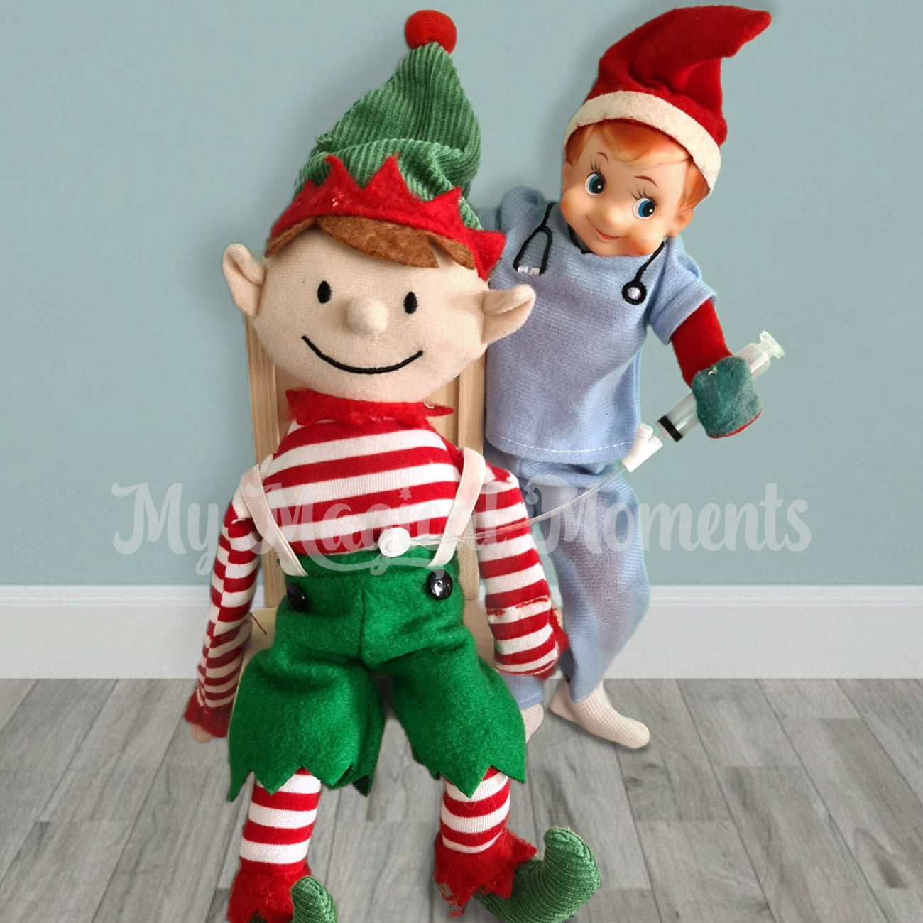 Elf dressed as a nurse, helping an elf for Christmas with a feeding tube