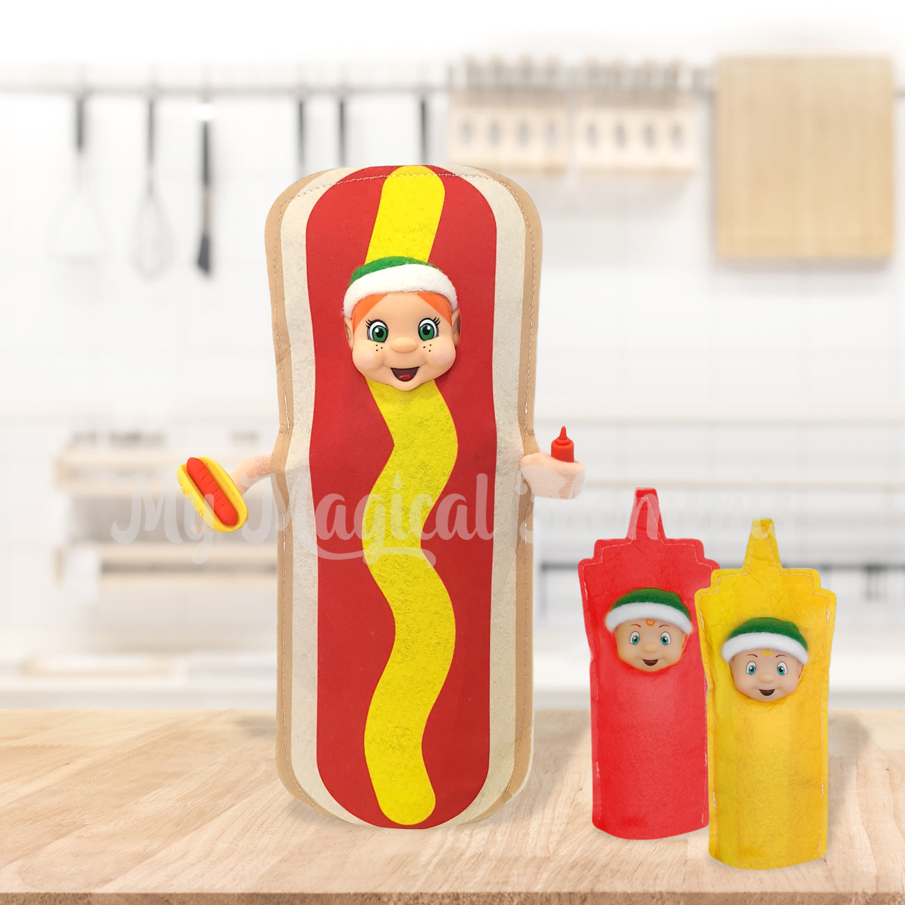 Elf dressed as a hot dog with elf toddlers dressed as tomato sauce and mustard