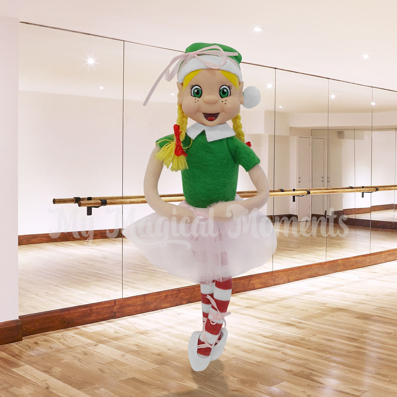Elf wearing ballet shoes posing in a dance studio