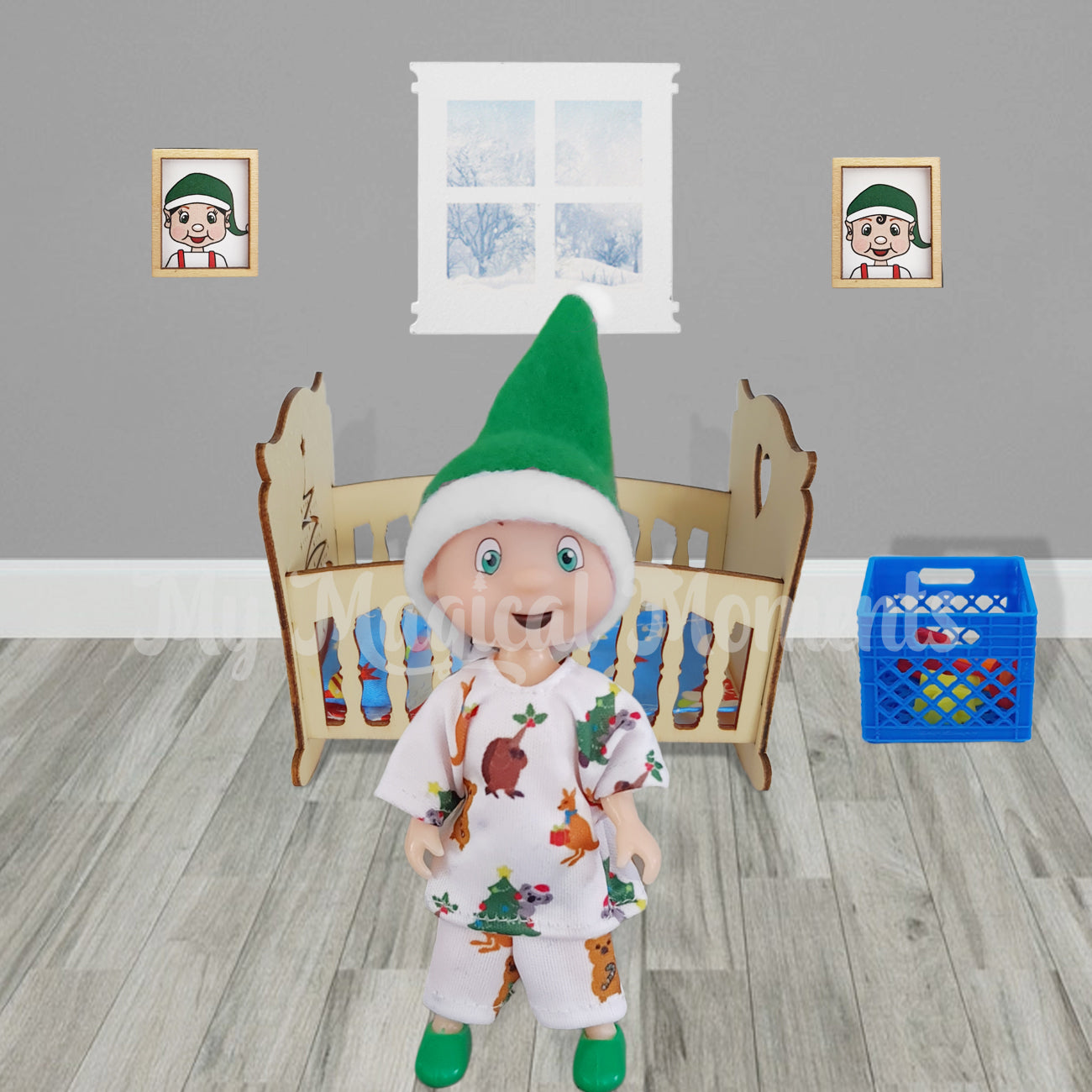 Toddler wearing Aussie themed Christmas elf pyjamas with cot and crate