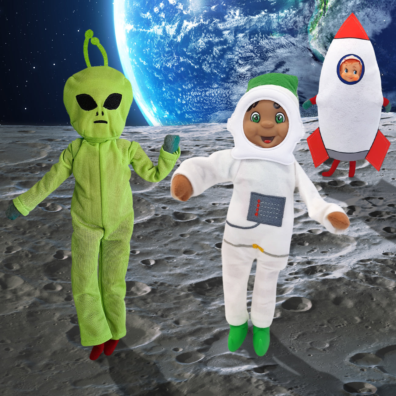 Elf Space scene. One elf is dressed as an astronaut another is an alien and the third is a rocketship