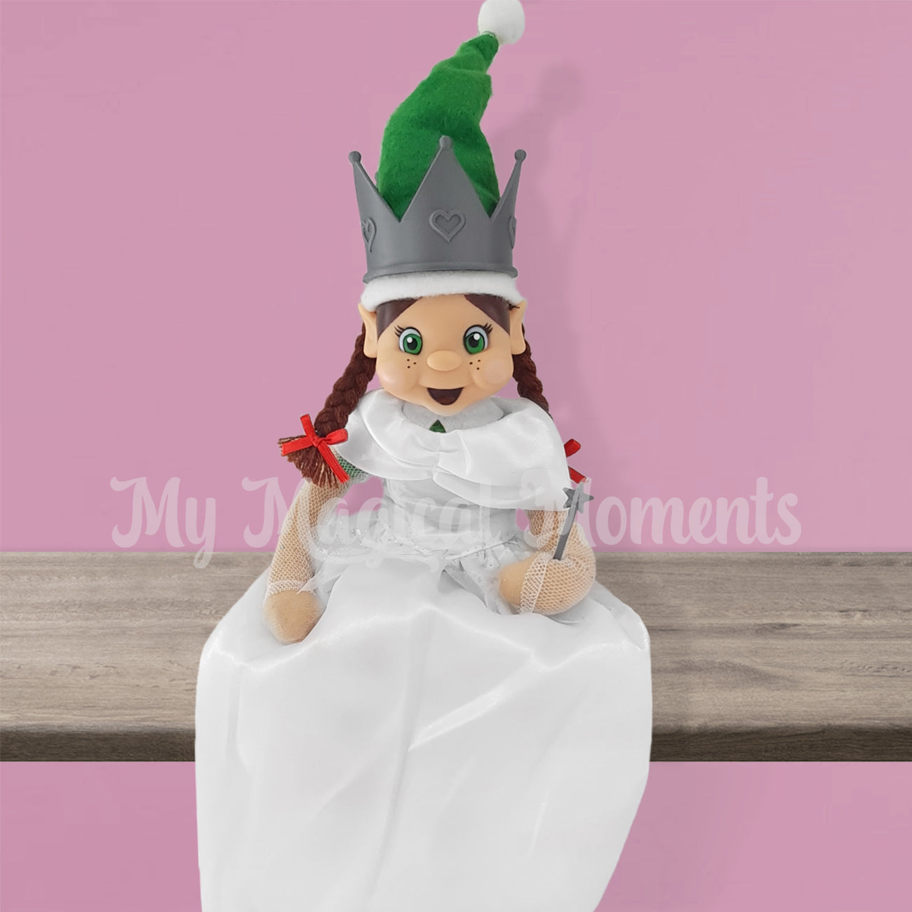 elf dressed as a princess wearing a crown