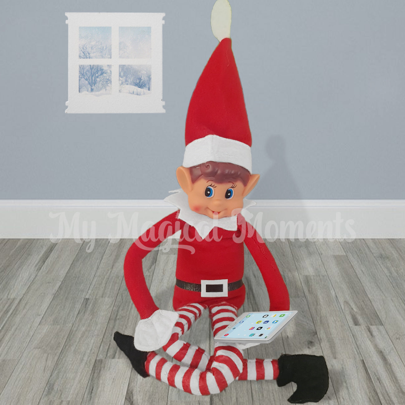 elf playing with an tablet