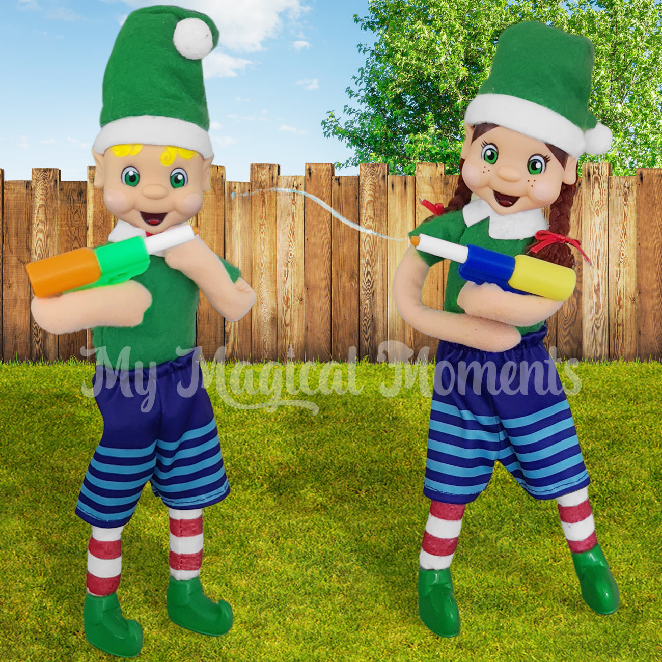 My elf friends wearing boardshorts playing with water guns