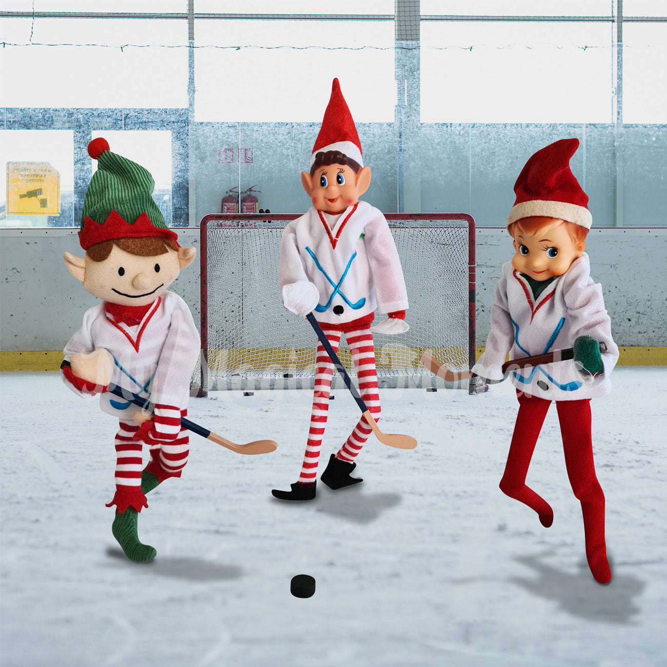 Elves playing hockey on ice with jerseys, hockey sticks and puck