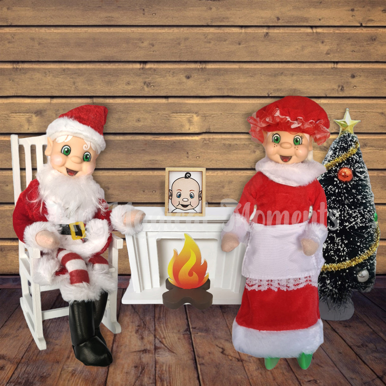 elves dressed as Claus family at the north pole sitting by the fireplace
