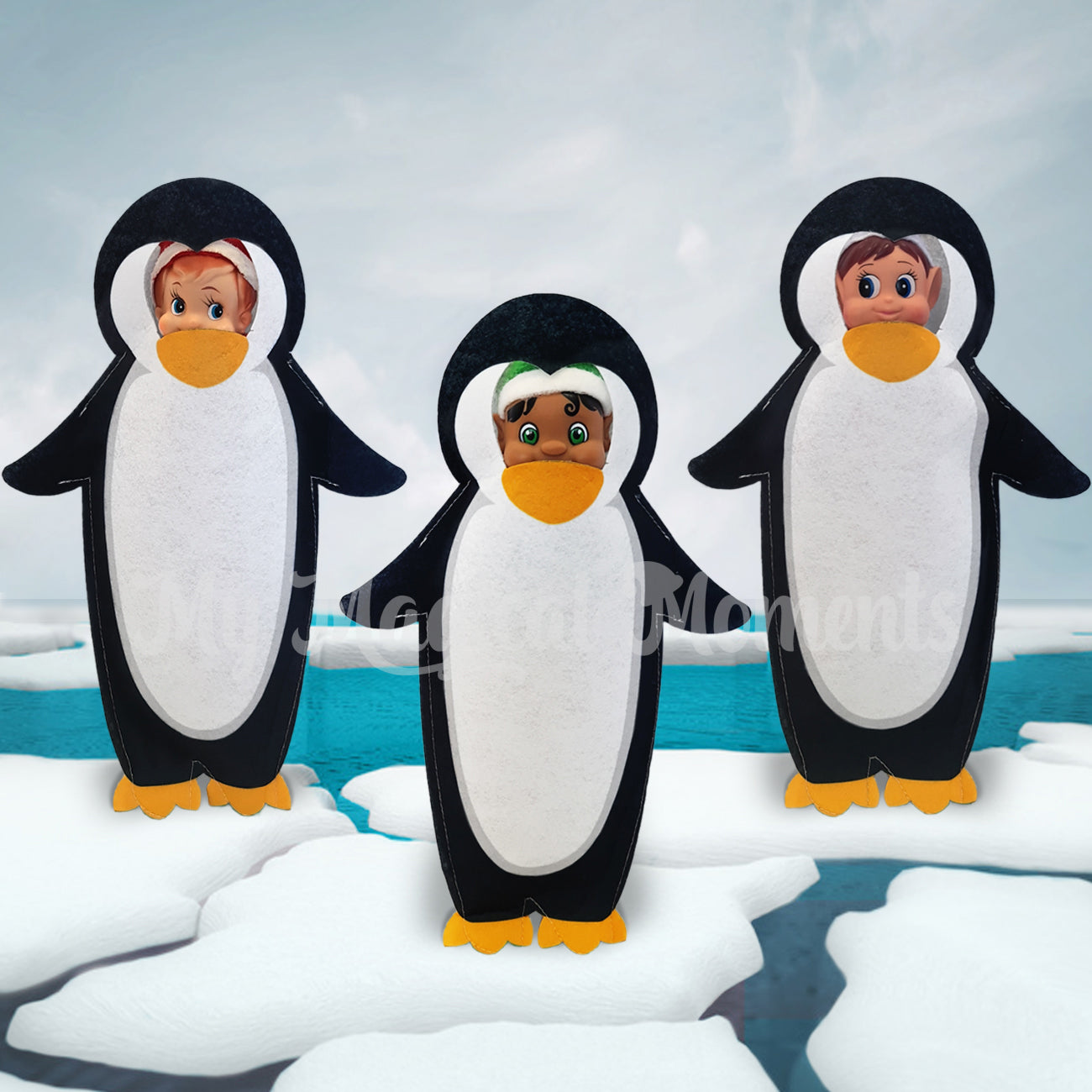 Three elves dressed as penguins on ice